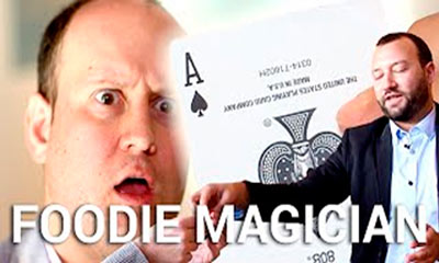 The Foodie Magician doing card tricks